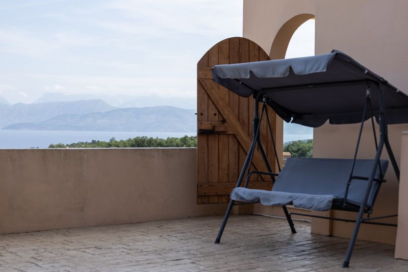 Garden swing with sea view